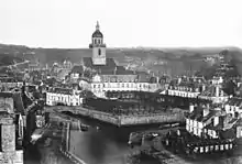 L'abbaye Sainte-Croix en 1860, entre l'Ellé et l'Isole, avec la Laïta au premier plan.