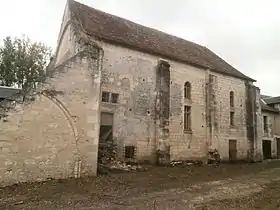 Photographie en couleurs de la nef d'une ancienne église reconvertie en habitation.