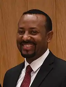 Photographie d'un homme éthiopien souriant.