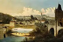 Tableau représentant le pont Charles à droite, avec sa tour, la rivière au premier plan et la ville au second plan avec la cathédrale et le quartier du château à l'arrière-plan.