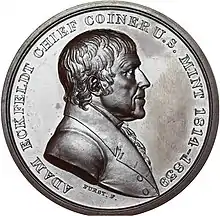 Médaille représentant le buste d'un homme, tourné vers la droite.