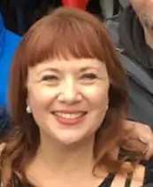 Description de l'image Aileen Quinn.png.