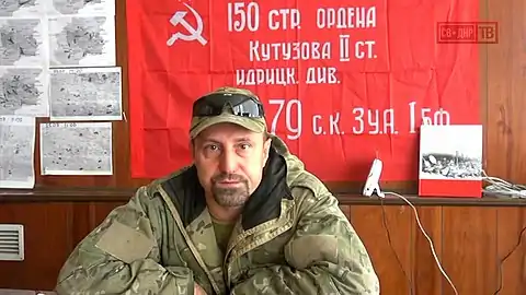 La bannière utilisée comme symbole politique : ici par un des chefs pro-russes en 2014, au début de la guerre du Donbass.