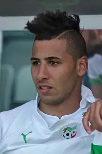 Taïder sous le maillot de l'Algérie en 2014.