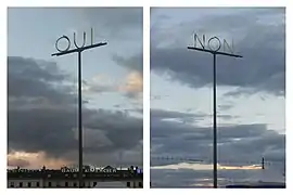 Ambigramme OUI / NON (2000-2002), du sculpteur Markus Raetz, installé en haut d'un mât sur la place du Rhöne à Genève, en Suisse, observé selon deux angles de vue.