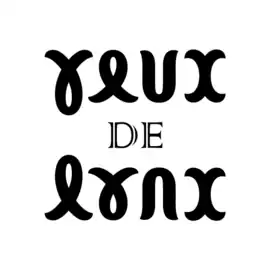 L'expression « yeux de lynx », ambigramme calligraphié par symétrie miroir d'axe horizontal.