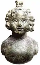 Buste d'Amour, en bronze exhumé dans la villa gallo-romaine de « La Bordinière », actuellement conservé au « Carré Plantagenêt », au Mans.