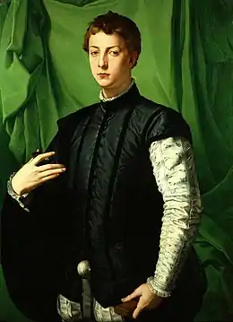  Peinture d'un jeune homme aux cheveux bruns portant une veste noire à manches blanches et se tenant debout devant un drap vert.