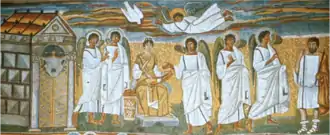 Mosaïque. Marie est assise entre plusieurs personnages en toge blanche ; la colombe et l'ange descendent du ciel.