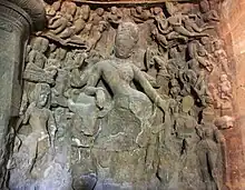 H. Shiva Ardhanari, androgyne, la double nature (homme et femme) de Shiva.
