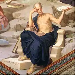 Aristote sur une fresque murale à Rome, assis sur une chaise qui semble de pierre, torse à peu près nu, la main gauche sur le front en une attitude de penseur et la main droite tenant un rouleau de textes