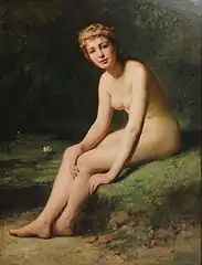 Female nude by pond with water lilies