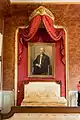 Chambre avec portrait d'Edmond Rostand.