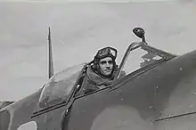 Photo d'Arnaud de Saxcé, pilote de chasse du Groupe Alsace, dans son cockpit.