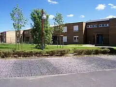 Stationnements perméables et logements en bois, ZAC de la Garenne, 2008.