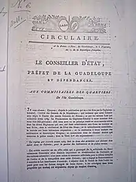 Circulaire du préfet colonial de la Guadeloupe aux commissaires des quartiers de la Guadeloupe du 6 prairial an X (26 mai 1803) diffusant la version imprimée localement de l'arrêté consulaire du 27 messidor an X (16 juillet 1802).