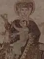 À partir du XIe siècle, les chanoines embellissent et développent leur seigneurie d'Asnières. C'est ainsi qu'ils achètent la nef et que selon leurs souhaits, les murs de l'église sont décorés. Ce sont les célèbres peintures murales mises au jour en 1951 par Madeleine Pré. Ici, Vierge en Majesté qui tient dans la main droite soit une perle, symbole de pureté soit un anneau nuptial symbole de l'alliance de la Vierge avec l'Esprit Saint.