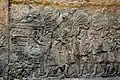 Soldats assyriens amassant du butin et des têtes de vaincus. Palais nord, British Museum.