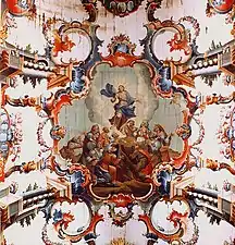 Mestre Ataíde, détail de l’Ascension du Christ au plafond de l'église matrice de Saint-Antoine à Santa Bárbara. Cette composition centrale de traits baroques insérés dans un cadre clairement rococo met en évidence les superpositions stylistiques qui ont caractérisé à la fois le baroque brésilien et l'œuvre de ce maître.