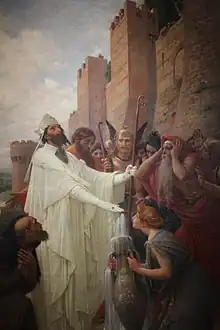 tableau représentant un évêque vêtu de blanc avec sa crosse bénissant des personnes au pied d'une muraille.