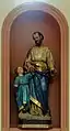 Statue polychrome de saint Joseph et l'Enfant Jésus.