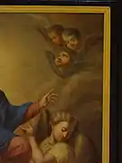 Détail du tableau de l'Assomption de la Vierge, dans le chœur : les visages sont les mêmes que ceux de la fresque de l'autel de la Vierge de la même église. Un peintre facétieux a doté un des angelots d'un nez d'ivrogne.
