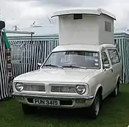 Version camionnette (phase 1 avec calandre séparée), transformée en camping-car.