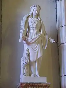 Sainte Marguerite d'Antioche à droite de l'autel du Saint-Sacrement.