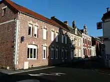 Photographie montrant des maisons à Avesnes-les-Aubert
