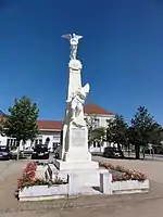 Le Poilu mourant en défendant le Drapeau (monument aux morts)