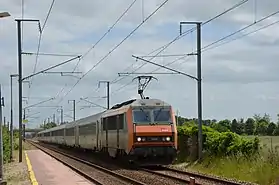 BB 26000 Béton, traversant Frénouville - Cagny (2015).