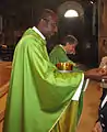 Mgr Imbamba, durant une messe à l'église Saint François à Lodi, le 23 août 2015.