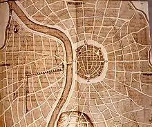 Plan du XVIIe siècle situant l’amphithéâtre (H) par rapport à la ville antique