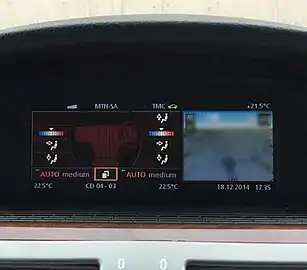 LCI iDrive montrant un menu climatisation.