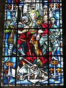Photo d'un détail de la baie 22 figurant la capture de Jeanne d'Arc en armure