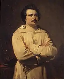 Portrait peint d'un homme moustachu, les bras croisés portant une robe de chambre blanche