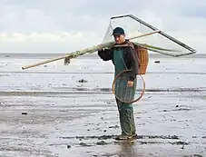 Pêcheur anglais avec un filet.
