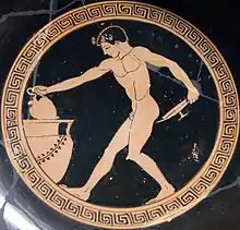 Éphèbe puisant dans un cratère grâce à une œnochoé pour remplir son kylix de vin, v. 490-480 av. J.-C., musée du Louvre.