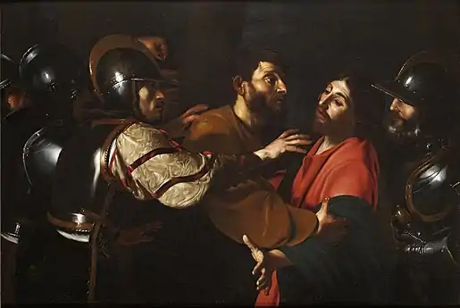 Tableau. Le Christ est arrêté par des soldats et embrassé par Judas.