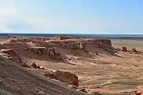 Photo du site de Flaming Cliffs, en Mongolie, lieu d'où fut découvert les premiers fossiles de vélociraptors.