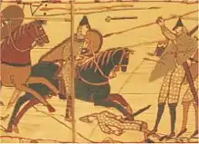 Eustache de Boulogne chargeant sa lance à bannière à trois tourteaux (en fait trois boules, jeux de mot avec Boulogne)