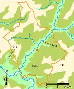 Vue d'une carte répartissant un territoire communal en grandes zones géologiques de couleurs différentes.