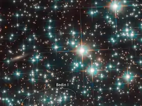La galaxie surnommée Bedin 1 se cache derrière les étoiles brillantes de NGC 6752 (télescope spatial Hubble).