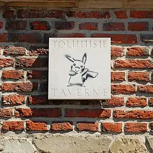 Enseigne de la taverne.