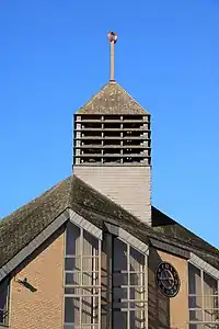 Le clocheton surmonté de « La Cité ».