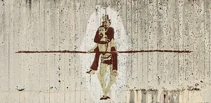 Fresque de funambules sur béton brut.