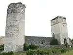 Château de Bellocqbarbacane, fossé, tour, courtine