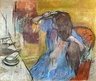 Femme à la coiffeuse par Edgar Degas