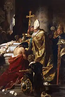 Peinture d'un évêque barbu versant une coupe d'eau sur la tête d'un homme dos nu, à genoux et priant