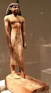 Statue. Bois stuqué et peint. XIIe dyn. Neues Museum